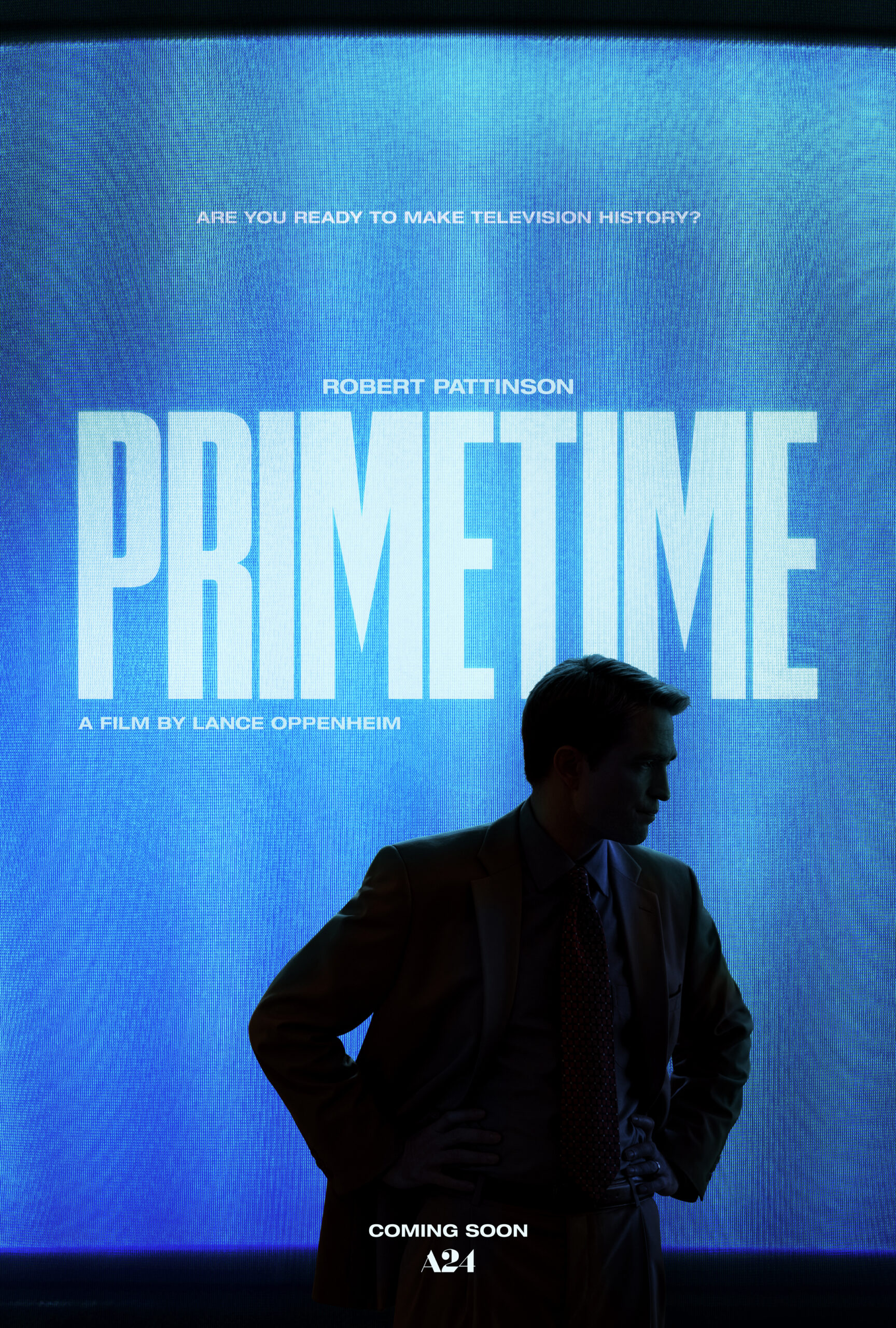 [gpt-4o]: Silhouette of a man against blue screen with text: "Are you ready to make television history? Robert Pattinson. Primetime. A film by Lance Oppenheim. Coming Soon. A24"